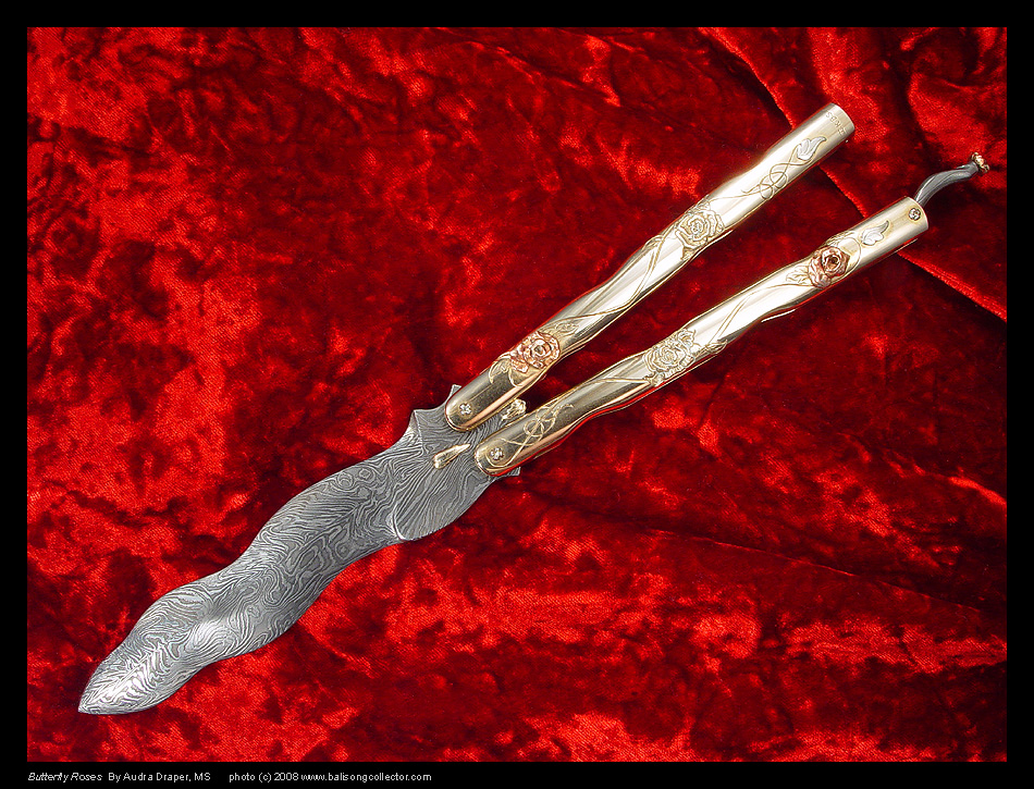 butterfly knife with rose design